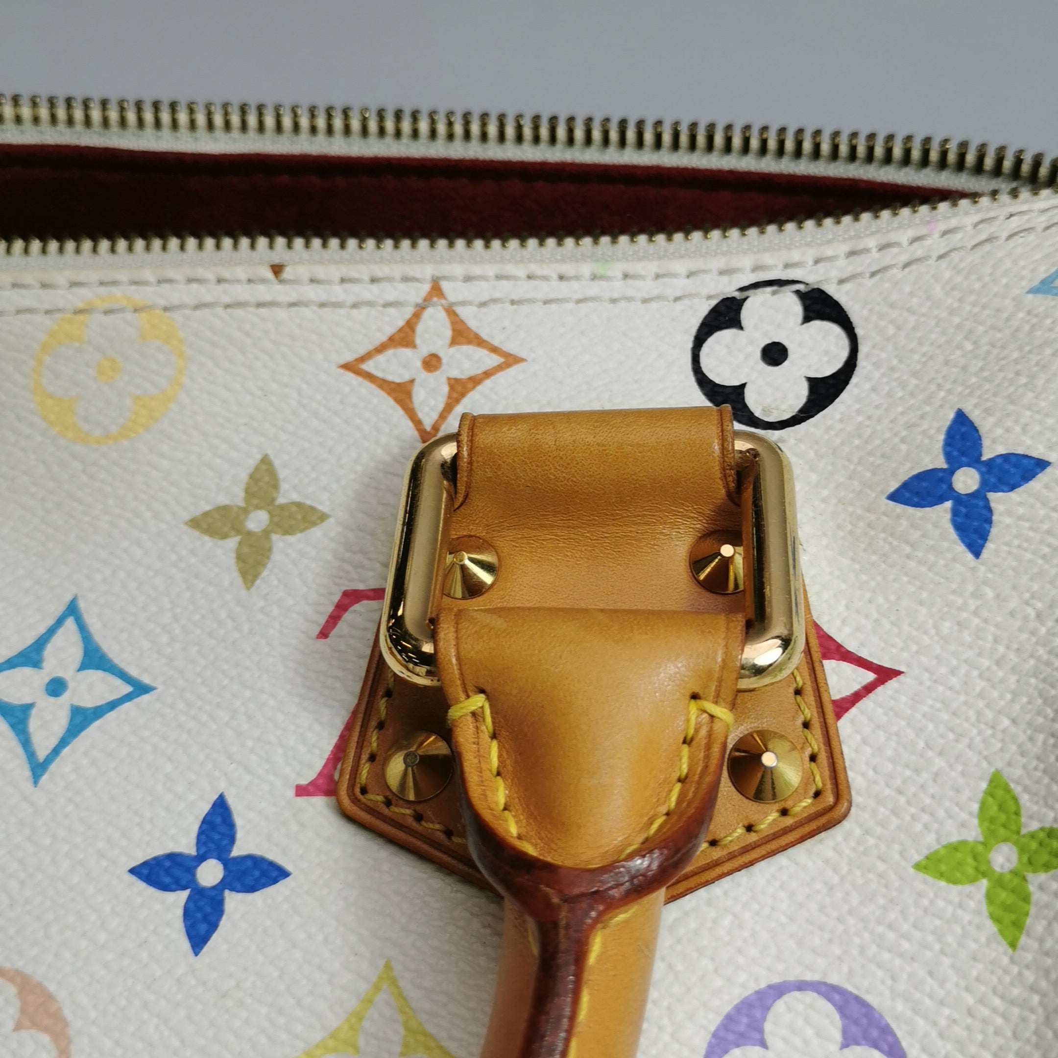 The Louis Vuitton Monogram Multicolore Speedy 30